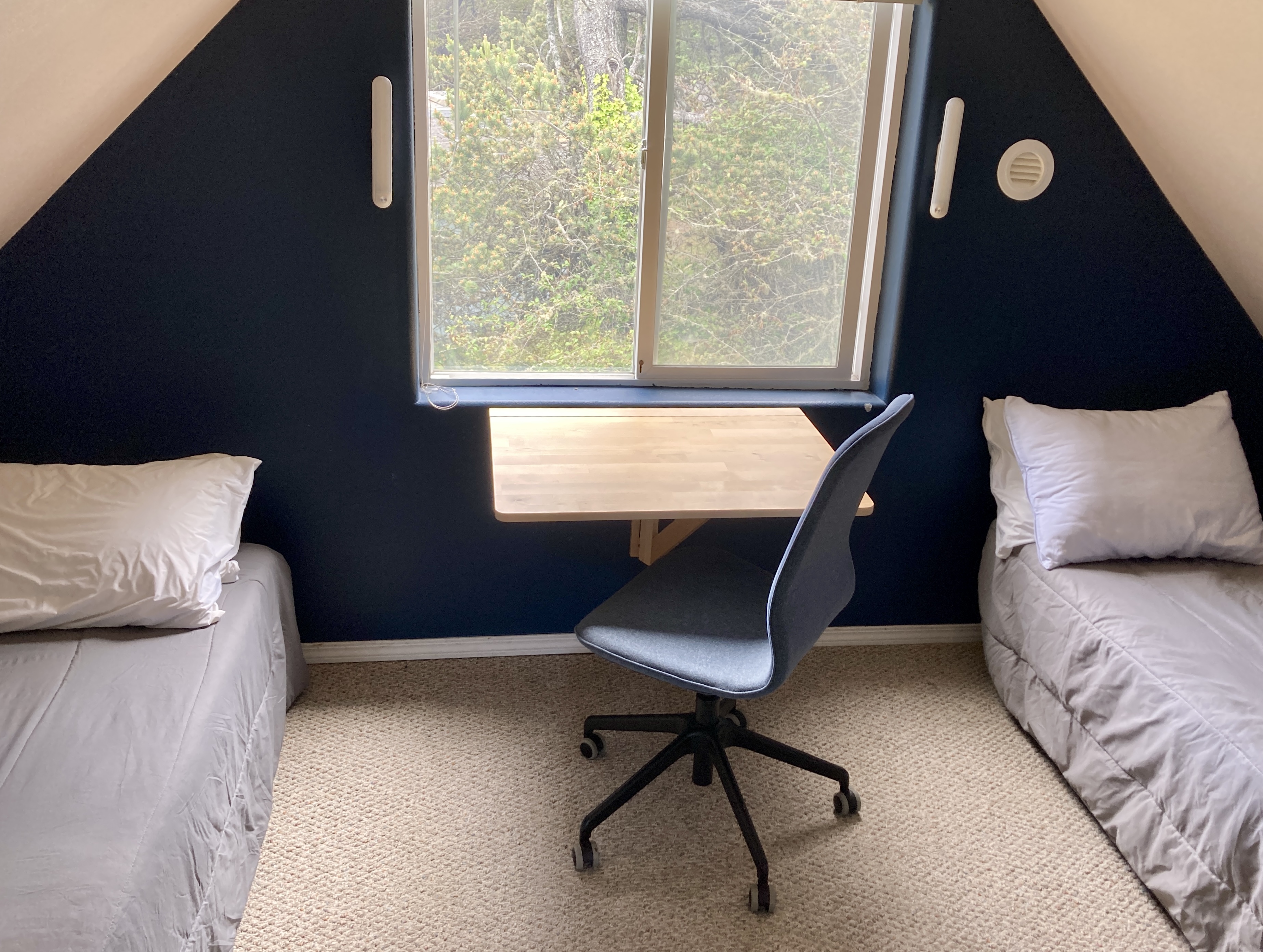 Twin beds with chair